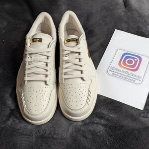 Jordan 1 Low Cream Sneakers with Gold Accents